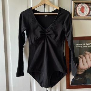 Arq long sleeve bodysuit